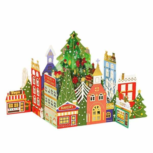 O1CN01Dv61yH1LmgSZsHeBt_2620801342-0-cib.jpg Colorful holiday paper craft featuring a festive Christmas village with decorated trees and shops.